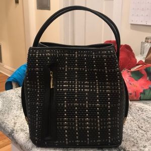 Black and gold metallic bucket purse